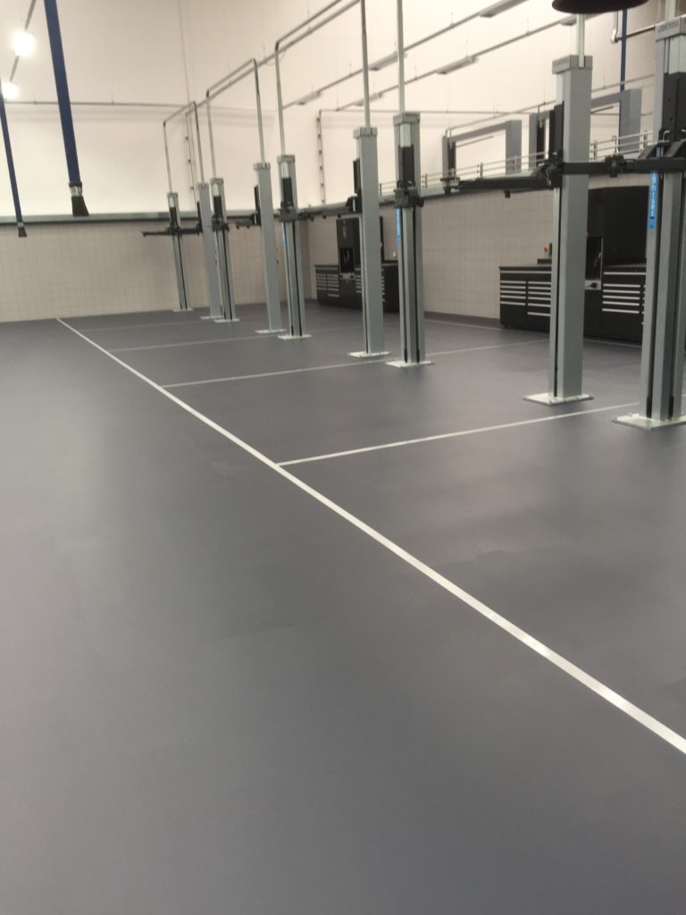 Automotive garages and car parks by Azzotech Resin Flooring