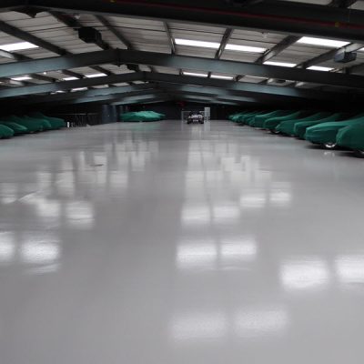 Automotive car storage, London Moss Automotive new pump screed floor with Flowcrete SF41 coating