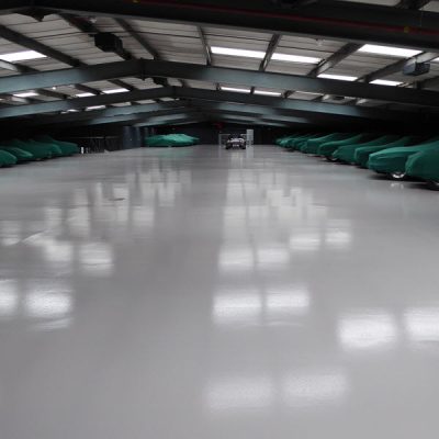 Automotive car storage, London Moss Automotive new pump screed floor with Flowcrete SF41 coating