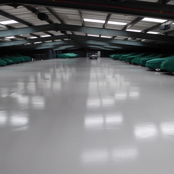 Automotive car storage, London Moss Automotive new pump screed floor with Flowcrete SF41 coating