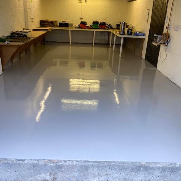 Garage workshop with pump screed and resin coatings to flooring