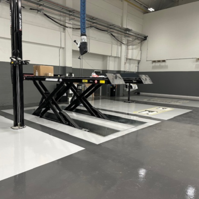 Epoxy Floor Coating with Safety Demarcation at Vehicle Workshop